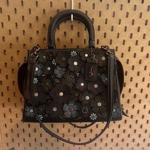 Coach Rogue 25 Handbag with Tea Rose Appliqué. Navy blue.